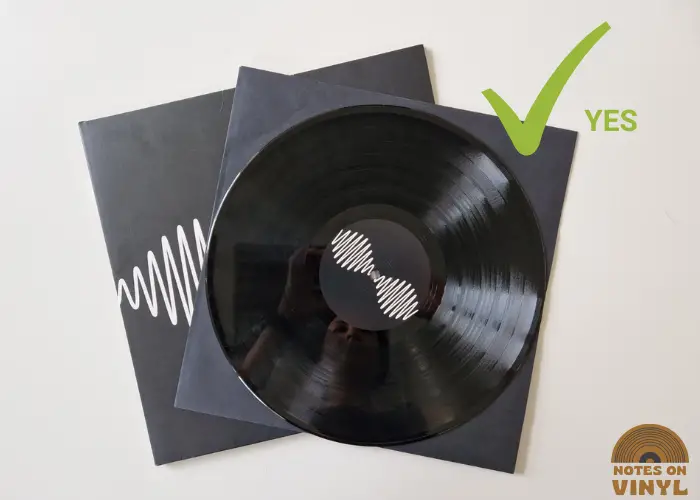 how to handle a vinyl record correctly