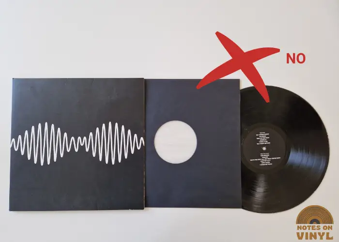how to handle a vinyl record