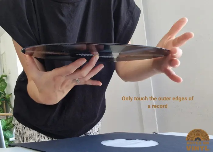 how to take vinyl out of sleeve