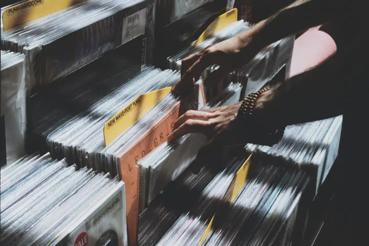 A person looking through vinyl records.