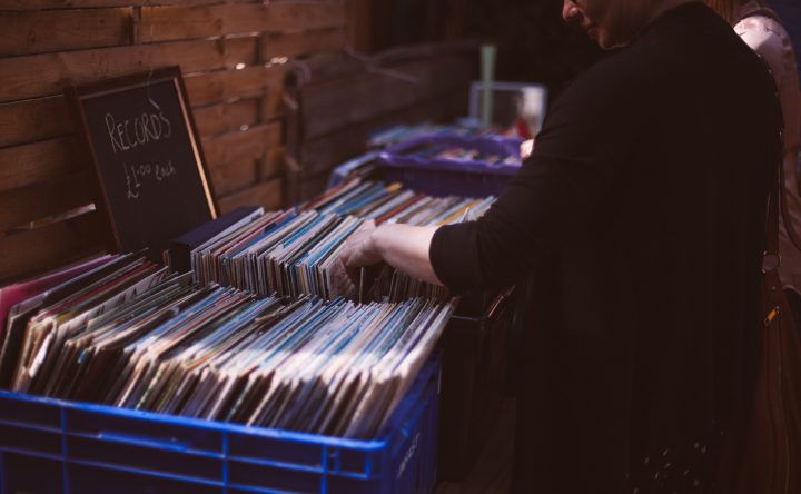 Organize vinyl records in a record crate.